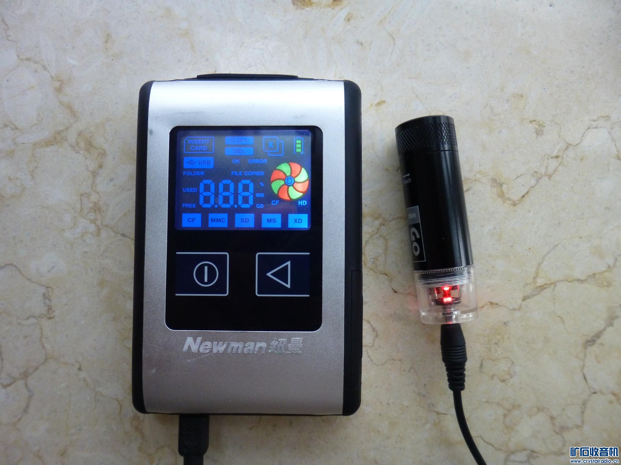 出纽曼数码伴侣、联想手机、德生收音机、应急