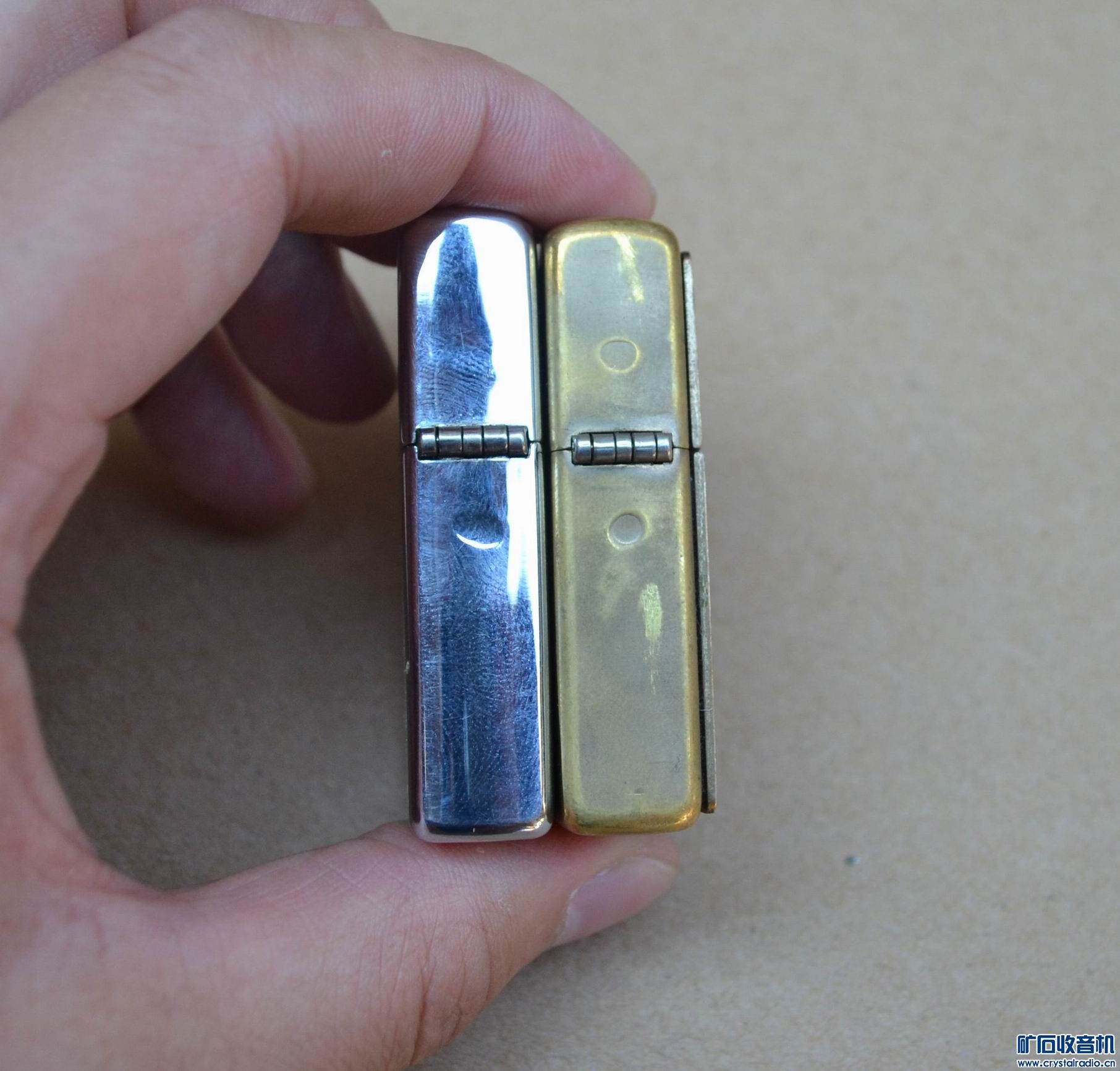 苹果无线鼠标,索尼微单16-50镜头,zippo打火机