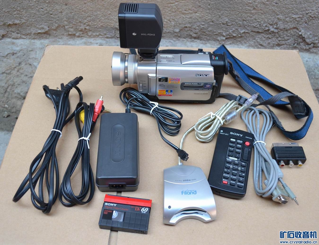 苹果无线鼠标,索尼微单16-50镜头,zippo打火机