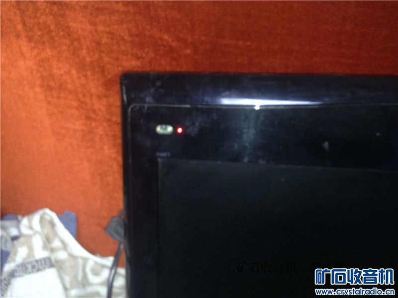 一个海尔26寸老款液晶电视，通电红灯亮，不开机