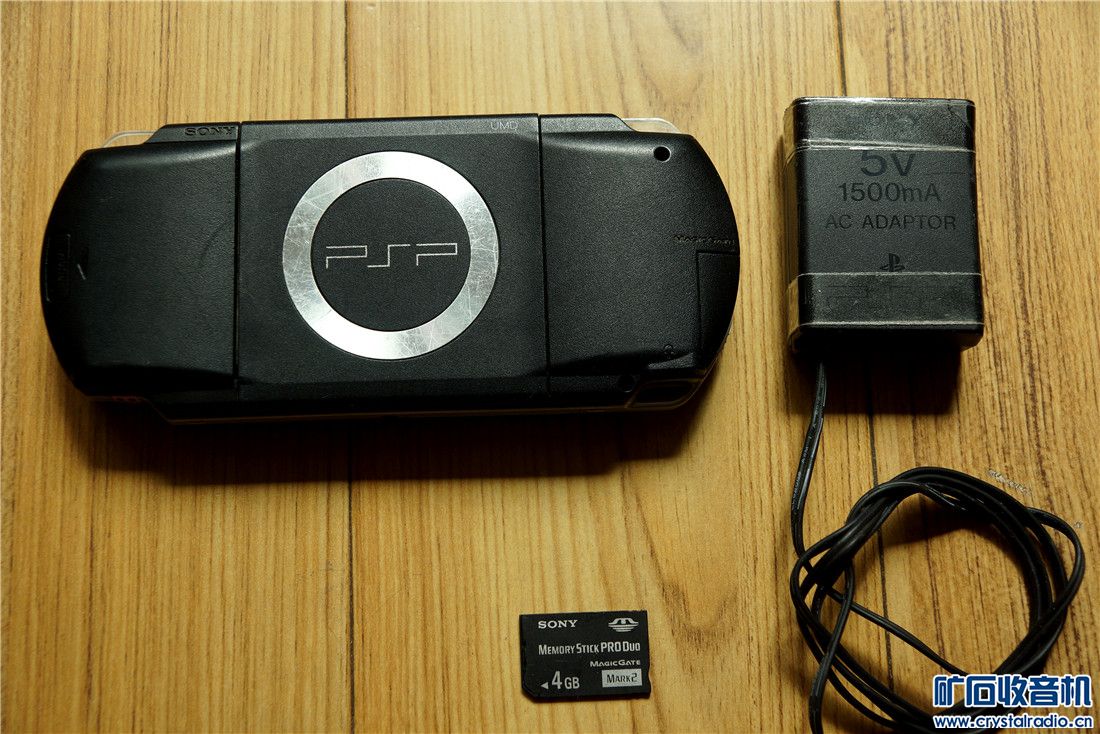 黑色PSP1000,4G记忆棒,线断了修过的原装充